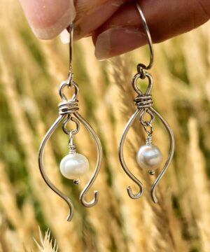 Coastal-inspired earrings with freshwater pearls and sterling silver