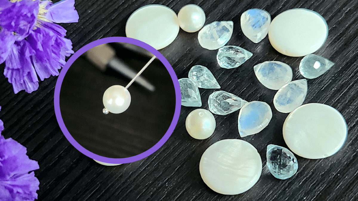 Natural materials like shells, freshwater pearls, aquamarine, rainbow moonstone, and mother-of-pearl for handmade jewelry inspired by the sea