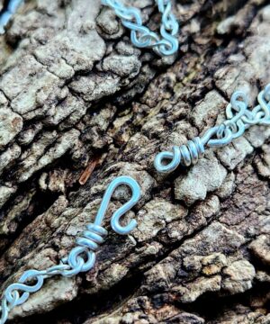 Sterling silver moonstone necklace clasp on log