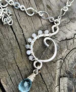 Handmade sterling silver aquamarine pendant with rainbow moonstones