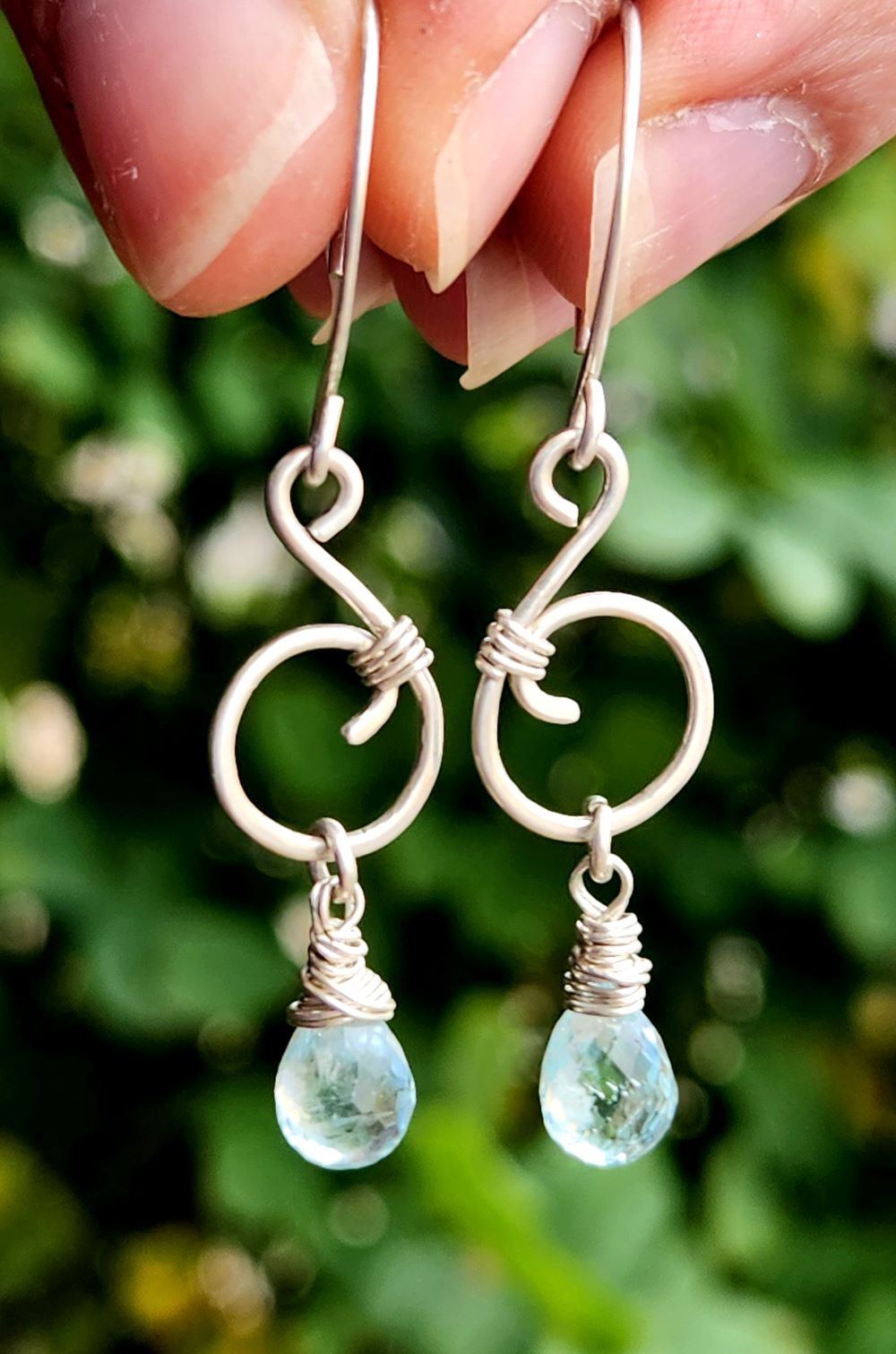 Handmade sterling silver music note earrings inspired by nature